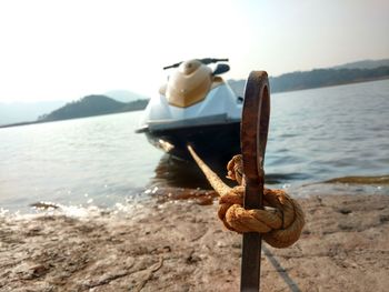Close-up of crab tied on boat