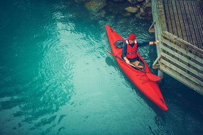 High angle view of red boat in sea