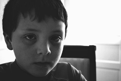 Close-up portrait of boy at home