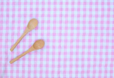 High angle view of bread on table against white background