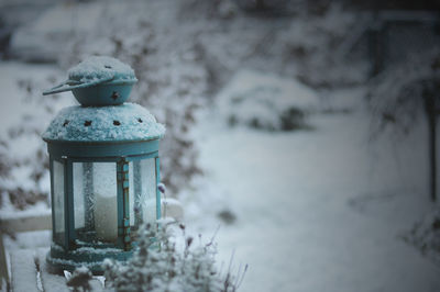 Close-up of lamp in snow