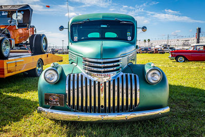 Old fashioned car on field