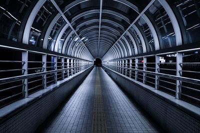 Empty illuminated footbridge