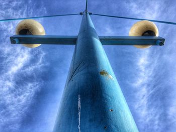 Low angle view of street light against sky