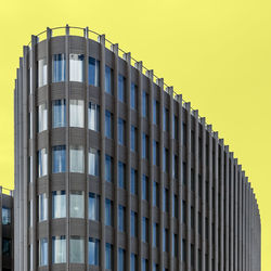 Low angle view of modern building against clear sky