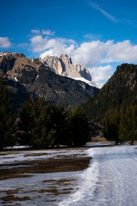 Scenic view of mountains against sky during winter