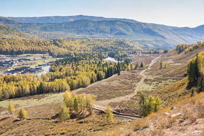 High angle view of landscape and mountains against sky