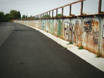 View of road along buildings