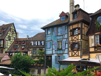 Low angle view of buildings against sky