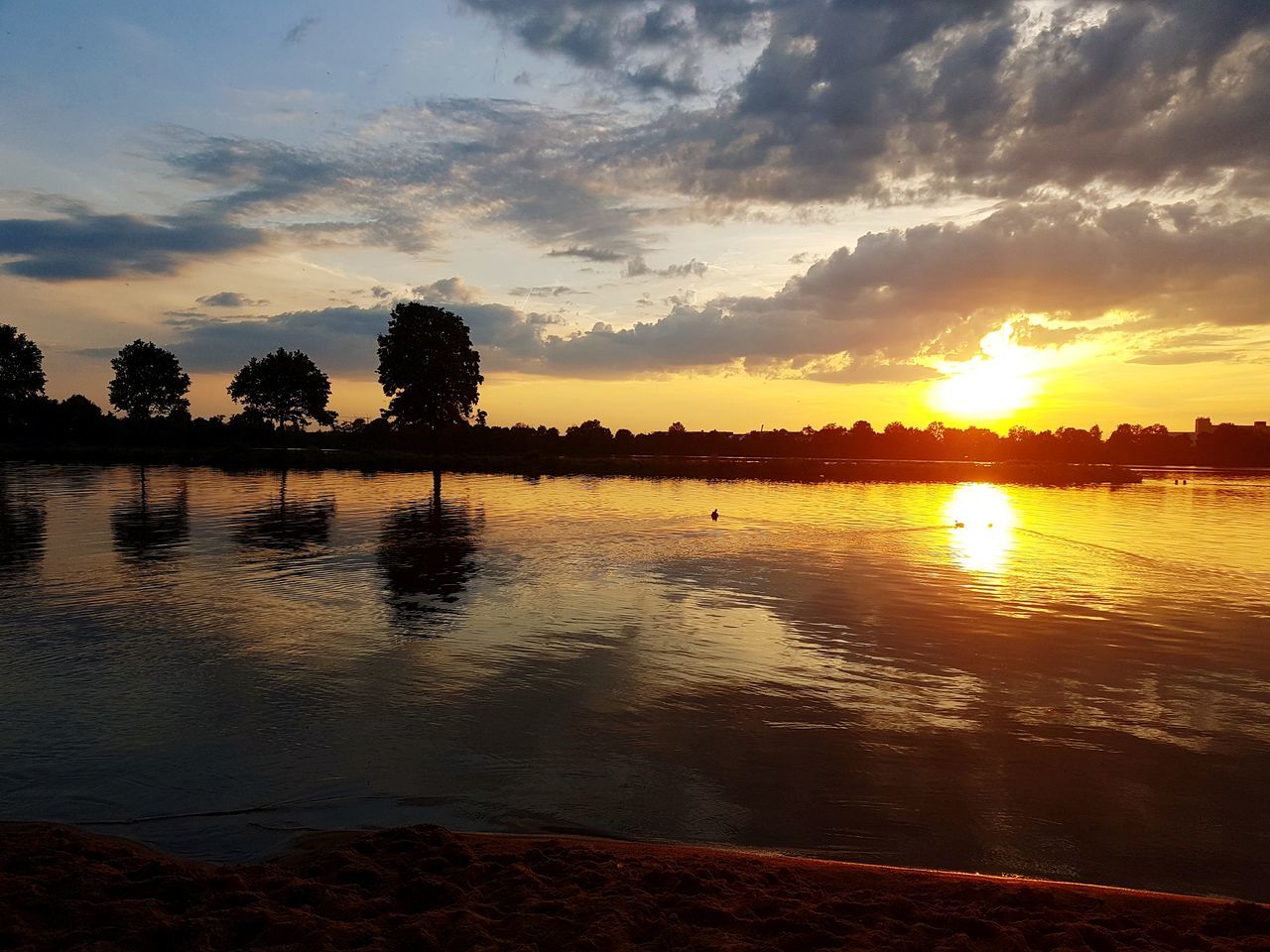 sky, sunset, water, tree, beauty in nature, scenics - nature, cloud - sky, reflection, tranquility, tranquil scene, nature, plant, lake, silhouette, orange color, no people, idyllic, non-urban scene, outdoors