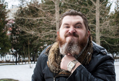 Man standing outdoors during winter