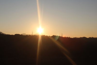 Scenic view of silhouette landscape against sky during sunset