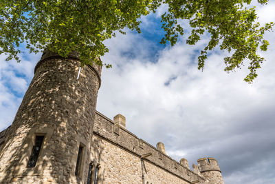 Low angle view of old building against sky