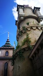 Low angle view of statue against sky