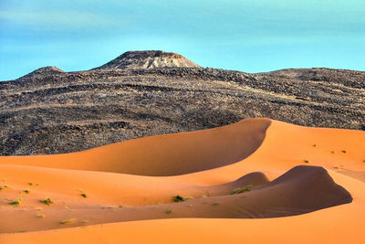 Scenic view of desert against sky