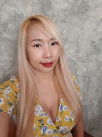 Portrait of beautiful woman with blond hair