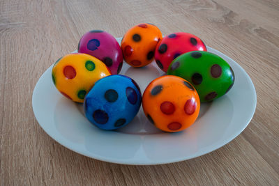 High angle view of multi colored candies on table