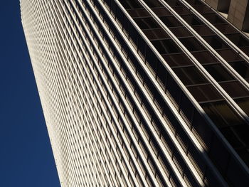 Low angle view of modern building against sky