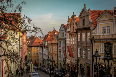 Houses in city against sky