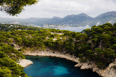 Beautiful view of the bay between rocky mountains with vegetation in the mediterranean sea 