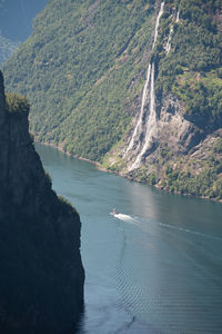 High angle view of river amidst mountains