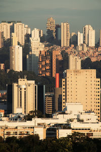 High angle view of buildings in city against sky