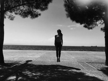 Full length of man against sea against clear sky