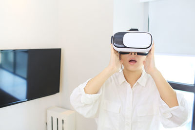 Woman game player with vr headset