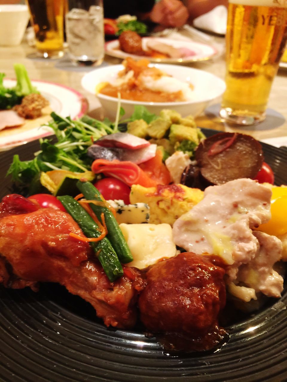 food and drink, food, ready-to-eat, meat, vegetable, freshness, table, indoors, refreshment, plate, close-up, still life, healthy eating, no people, meal, beer, drink, focus on foreground, serving size, salad, glass, dinner