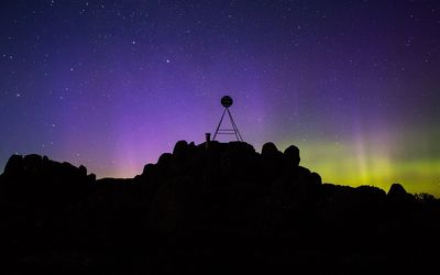 Tower on mt wellington against star field