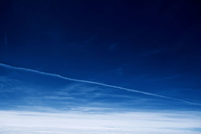 Low angle view of vapor trail in sky