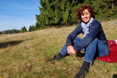 Portrait of smiling man on field