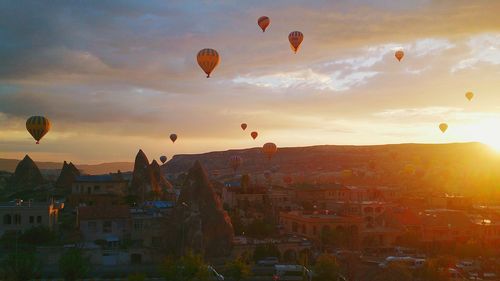 Hot air balloons in city