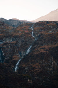 Scenic view of rocky mountains against sky