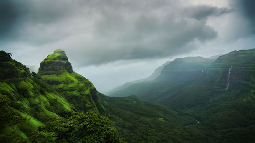 Scenic view of mountains against sky... monsoon