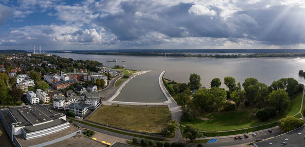 High angle view of road by sea against sky