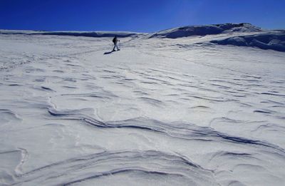 Scenic view of snow covered mountains