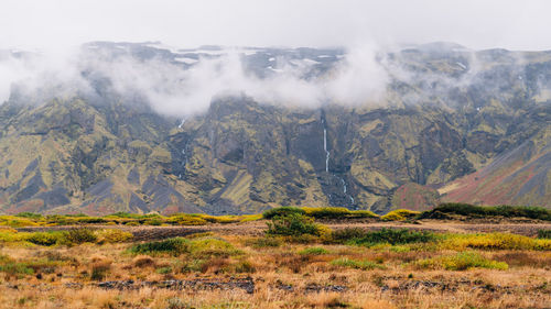 Scenic view of land against sky