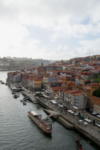 Boats moored at harbor