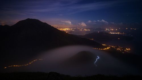 View of illuminated mountains at night