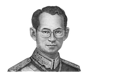 Portrait of young man against white background