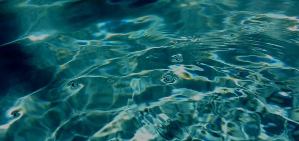 Full frame abstract shot of rippled torquoise water