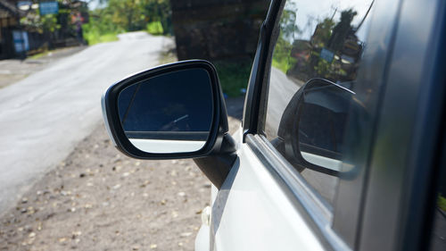 Close-up of side-view mirror
