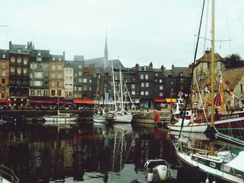 Boats moored in canal