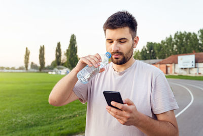 Young man using mobile phone