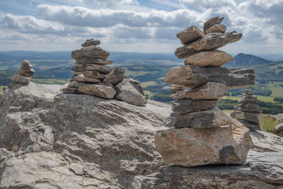 Stack of rocks against sky