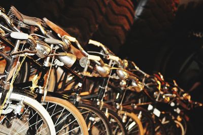 Close-up of bicycles parked in row