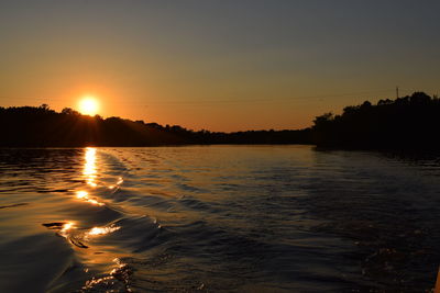 Scenic view of sunset over river