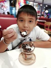 Portrait of boy with ice cream