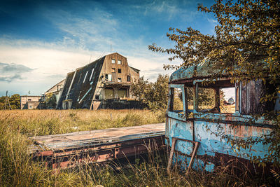 Abandoned building against sky